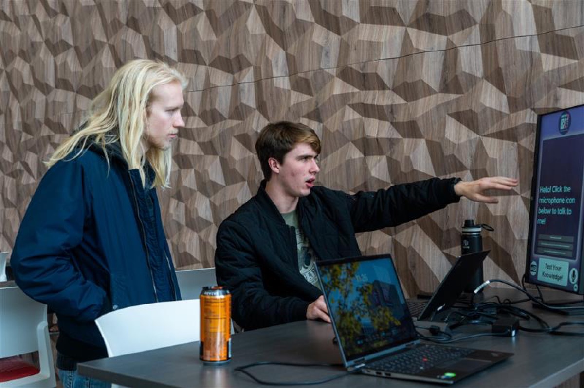 Students collaborating during hackathon